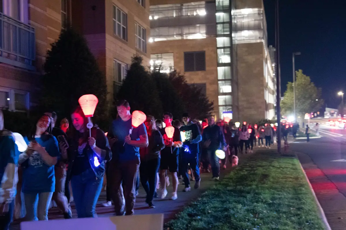 Close view of glowing lanterns at a Light the Night charity walk