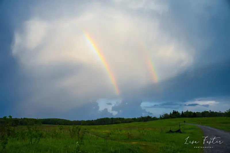 Double rainbow over a green Shenandoah Valley meadow