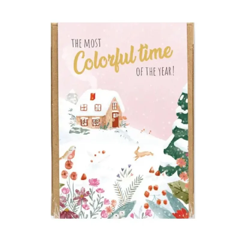 Winter Landscape Seed Bomb Gift Box with a snowy cottage illustration.
