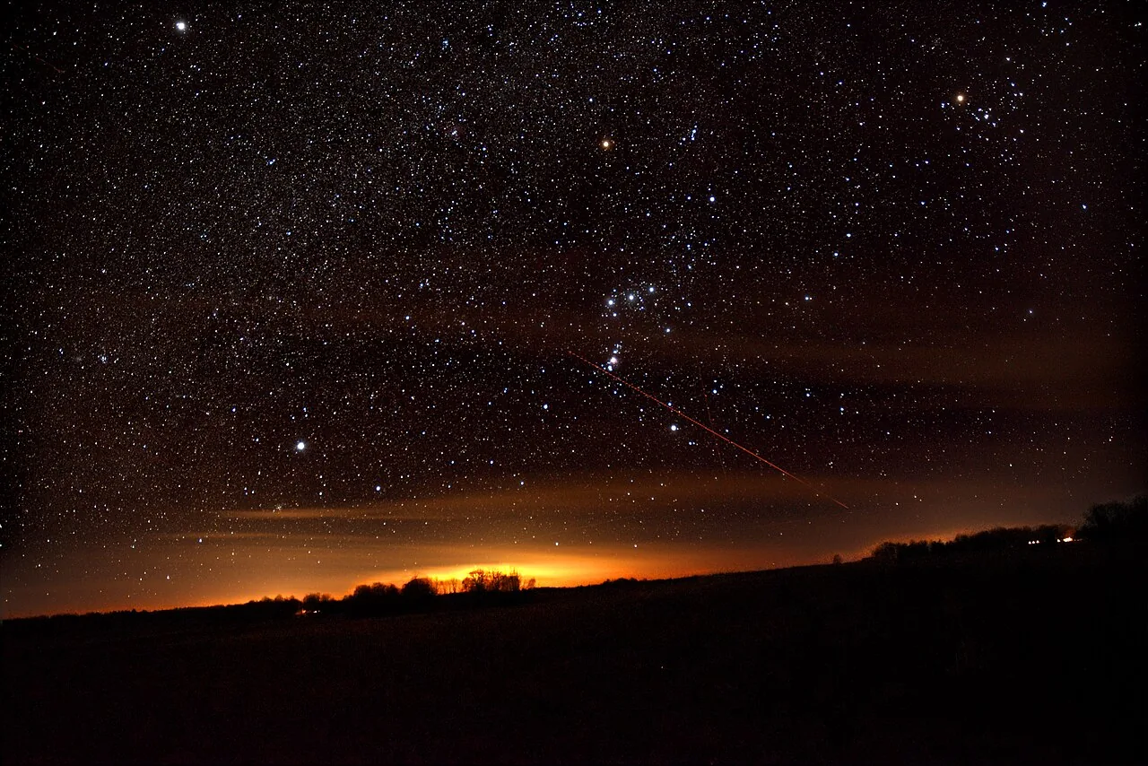 The constellation Orion in a dark, star-filled sky